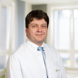 Portraitaufnahme von Dr. med. Andreas Vosschulte